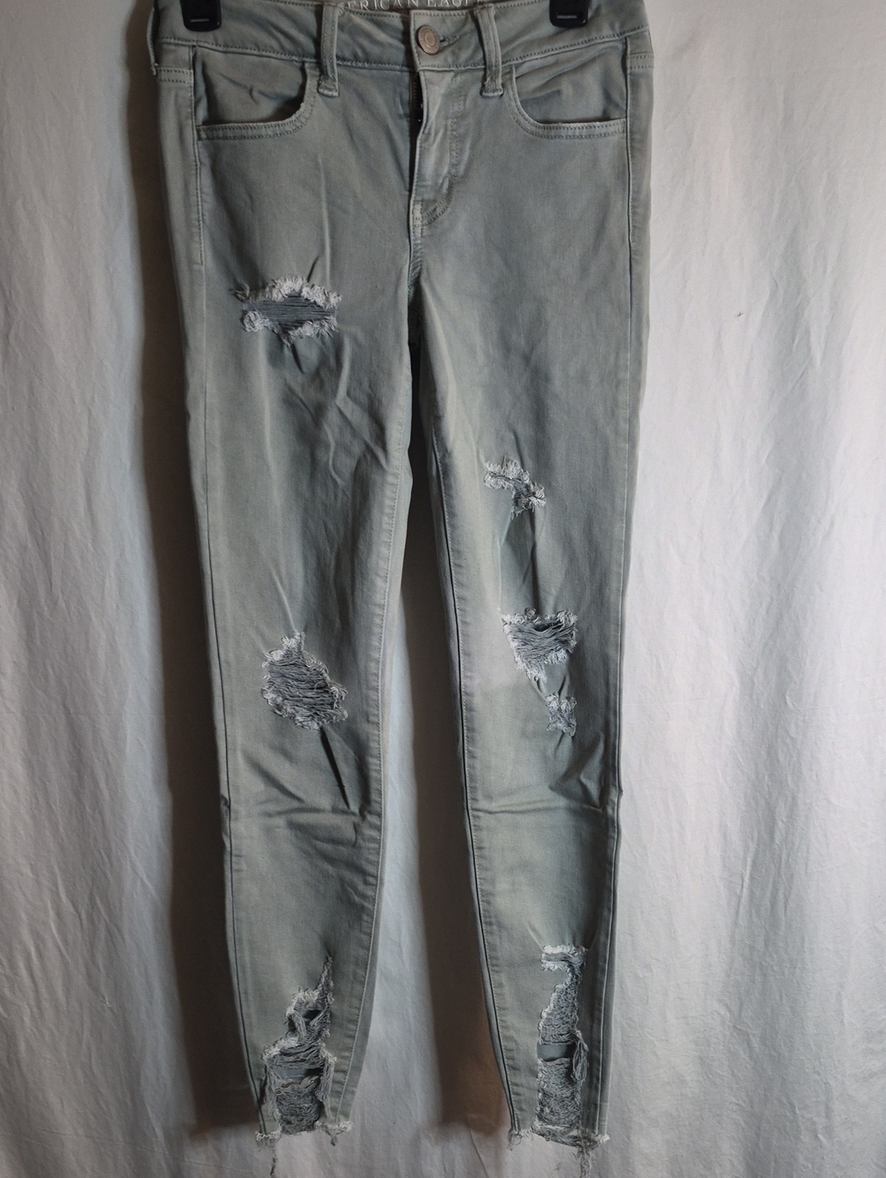 American Eagle Outfitters Light Gray Ripped Skinny Jeans